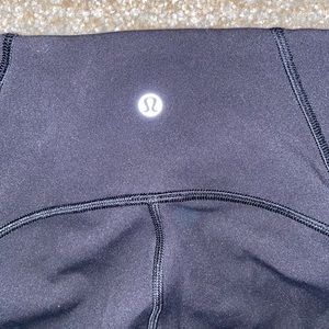 Lululemon black crop w/ mesh on lower leg